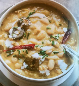 A bowl of white chicken chili